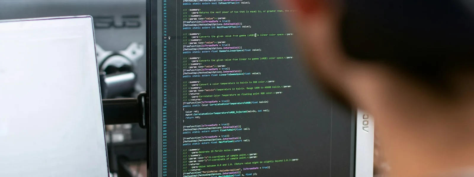 Technical workspace with software displayed on a monitor
